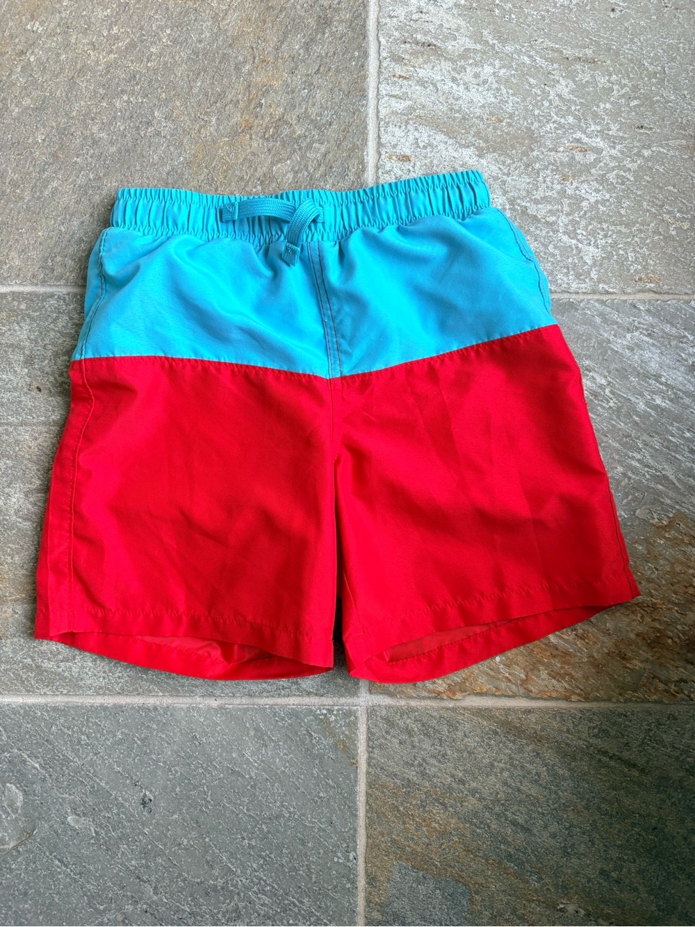 Primary Boys Colorblock Swim Trunks in Turquoise and Red